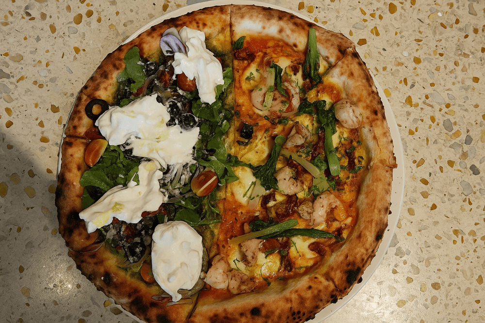 Wood-fired pizza oven at Pizza 4P's creating authentic Italian flavors with Japanese precision